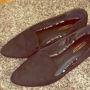 Black snakeskin flats